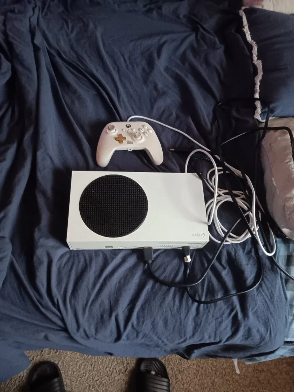 Microsoft Xbox series s console with controller